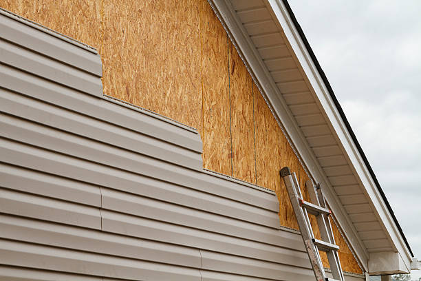 Professional Storm Damage Siding Repair technician working in Fork, MD